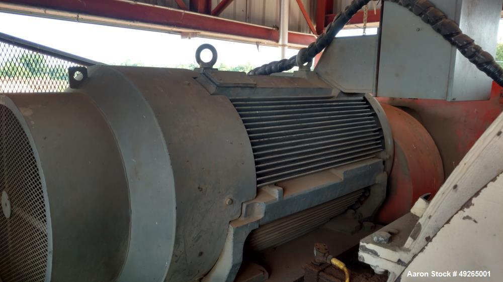 Used Pallmann Universal Long Log Flaker, Type PZU 19-600. Spec for 700 Kw / 938 hp. Inside max : 400. The voltage on this unit is 3 phase 480 volt for all of the motors and 120 volt and 24 volt for t...