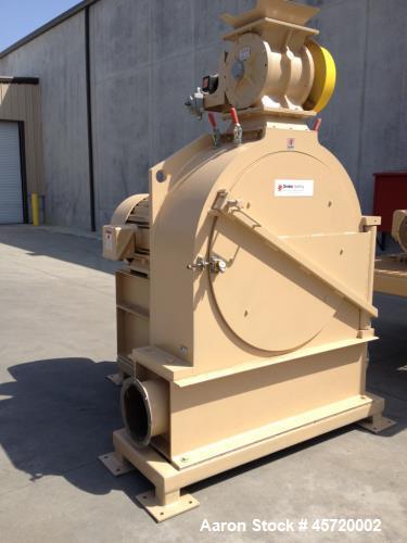 Used Prater Model MM-18 Mega Mill. Unit has 150HP motor and has carbon steel contact. Hammer type: tool temp. Screen size: round hole triangular. Includes feed inlet, inlet, door and rear linere, air...