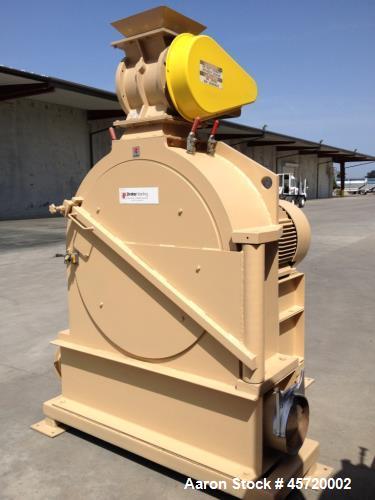 Used Prater Model MM-18 Mega Mill. Unit has 150HP motor and has carbon steel contact. Hammer type: tool temp. Screen size: round hole triangular. Includes feed inlet, inlet, door and rear linere, air...