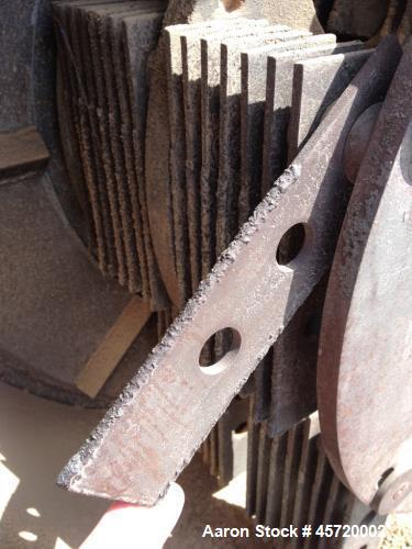 Used Prater Model MM-18 Mega Mill. Unit has 150HP motor and has carbon steel contact. Hammer type: tool temp. Screen size: round hole triangular. Includes feed inlet, inlet, door and rear linere, air...