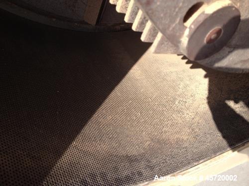 Used Prater Model MM-18 Mega Mill. Unit has 150HP motor and has carbon steel contact. Hammer type: tool temp. Screen size: round hole triangular. Includes feed inlet, inlet, door and rear linere, air...