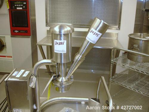 Used Quadro Comil, Model 193, Stainless Steel. Gravity feed with feed chute, beater and screen. Direct coupled .25 hp motor with VFD controller. Bench top design on stand, seria l#0064.  PRICE INCLUD...