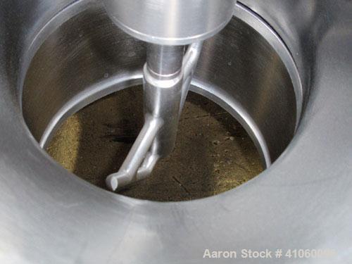 Used Quadro Comil, Model 194S, 316 Stainless Steel. Approximate 8" diameter impeller with screen, approximate capacity up to 4000 pounds an hour. Top feed, bottom discharge with swing away discharge ...