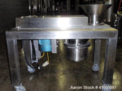 Used Quadro Comil, Model 194S, 316 stainless steel. Approximate 8" diameter impeller with screen, Approximate capacity up to 4000 pounds an hour. Top feed, bottom discharge with swing away discharge ...