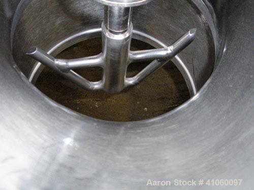 Used Quadro Comil, Model 194S, 316 stainless steel. Approximate 8" diameter impeller with screen, Approximate capacity up to 4000 pounds an hour. Top feed, bottom discharge with swing away discharge ...