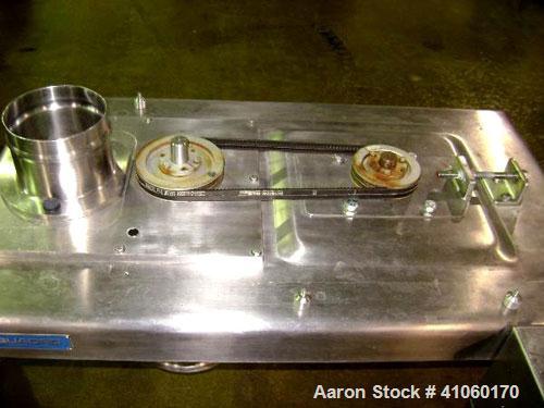 Used Quadro Comil, Model 194-S, Stainless Steel. 8" diameter screen, on legs with 5 hp, 230/460 volt motor. Serial #0223.