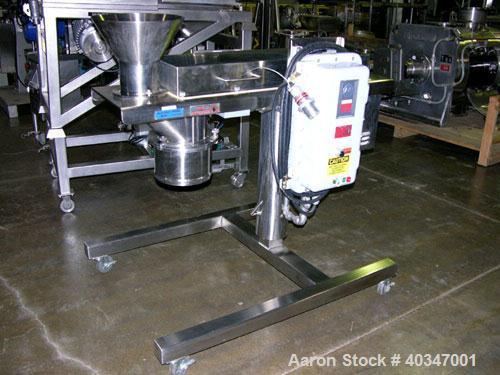 Used Quadro Comil, model 194P, stainless steel. Approximate 8" diameter screen, approximate capacity up to 4000 pounds an hour. Driven by a 5 hp motor with beater. Mounted on a stand.