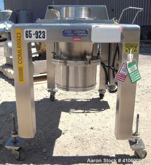 Used Quadro Comil, Model 194S, 316 Stainless Steel. Approximate 8" diameter impeller no screen, approximate capacity up to 4000 pounds an hour. Top feed, bottom discharge with swing away discharge sh...