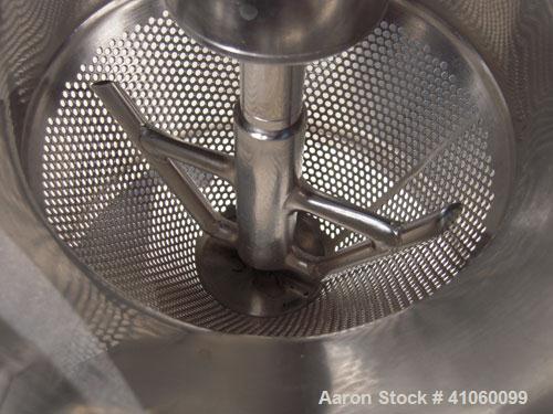 Used Quadro Comil, Model 194S, 316 Stainless Steel. Approximate 8" diameter impeller screen, approximate 1/8" diameter screen holes. Approximate capacity up to 4000 pounds an hour. Top feed, bottom d...