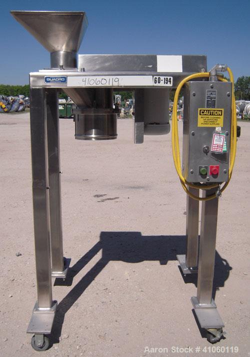 Used Quadro Comil, Model 194S, 316 stainless steel. Approximate 8" diameter impeller, no screen, Approximate capacity up to 4000 pounds an hour. Top feed, bottom discharge with swing away discharge s...