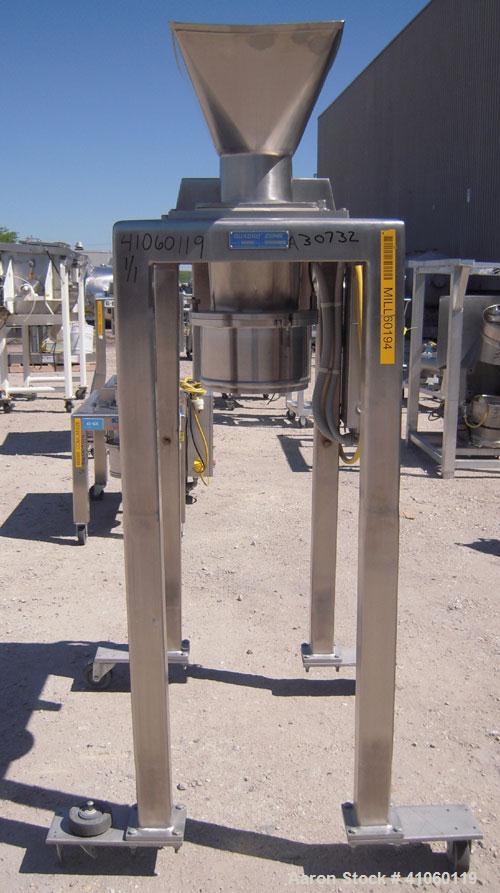Used Quadro Comil, Model 194S, 316 stainless steel. Approximate 8" diameter impeller, no screen, Approximate capacity up to 4000 pounds an hour. Top feed, bottom discharge with swing away discharge s...