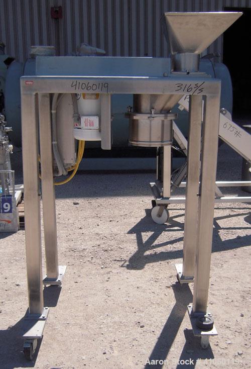 Used Quadro Comil, Model 194S, 316 stainless steel. Approximate 8" diameter impeller, no screen, Approximate capacity up to 4000 pounds an hour. Top feed, bottom discharge with swing away discharge s...