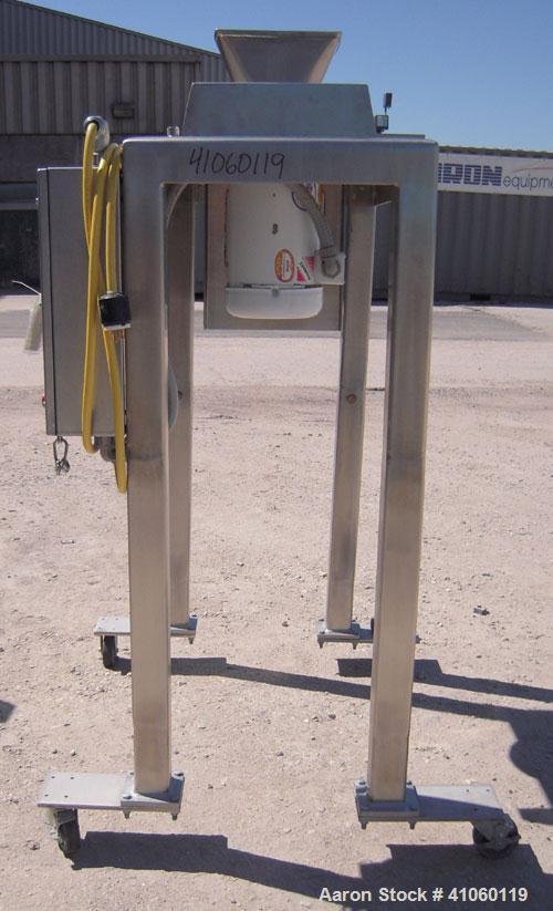 Used Quadro Comil, Model 194S, 316 stainless steel. Approximate 8" diameter impeller, no screen, Approximate capacity up to 4000 pounds an hour. Top feed, bottom discharge with swing away discharge s...