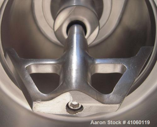 Used Quadro Comil, Model 194S, 316 stainless steel. Approximate 8" diameter impeller, no screen, Approximate capacity up to 4000 pounds an hour. Top feed, bottom discharge with swing away discharge s...