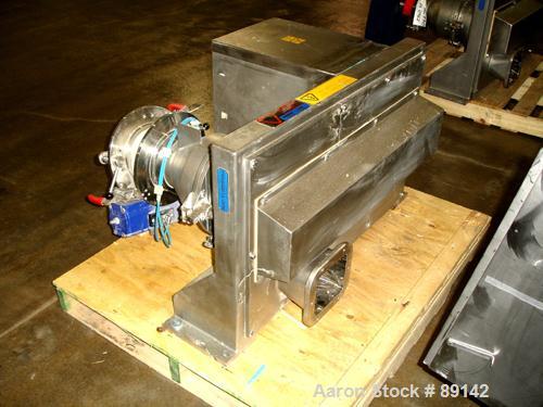 Used Quadro Comil, Model 194S, Stainless Steel. Approximate 8" diameter impeller, no screen, Approximate capacity up to 4000 pounds an hour. Top feed, bottom discharge with swing away discharge shrou...