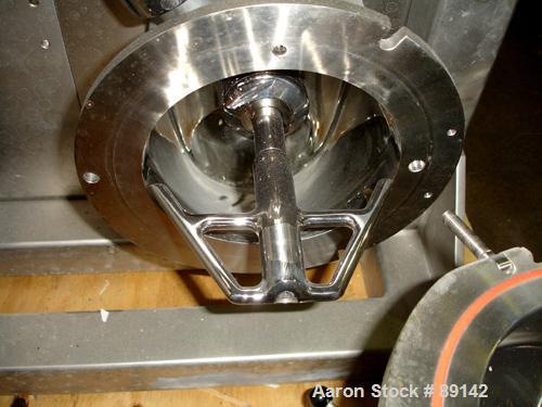 Used Quadro Comil, Model 194S, Stainless Steel. Approximate 8" diameter impeller, no screen, Approximate capacity up to 4000 pounds an hour. Top feed, bottom discharge with swing away discharge shrou...