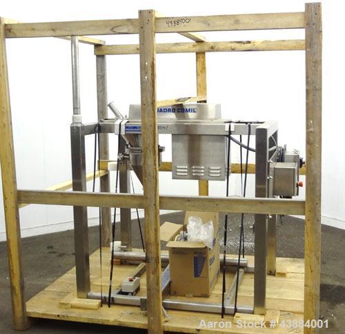 Used Quadro Comil, Model 194 Ultra, 316/304 Stainless Steel. Approximately 8" diameter impeller, with screens. Approximate capacity up to 4000 pounds an hour.  2" Tri-clamp top feed, bottom discharge...