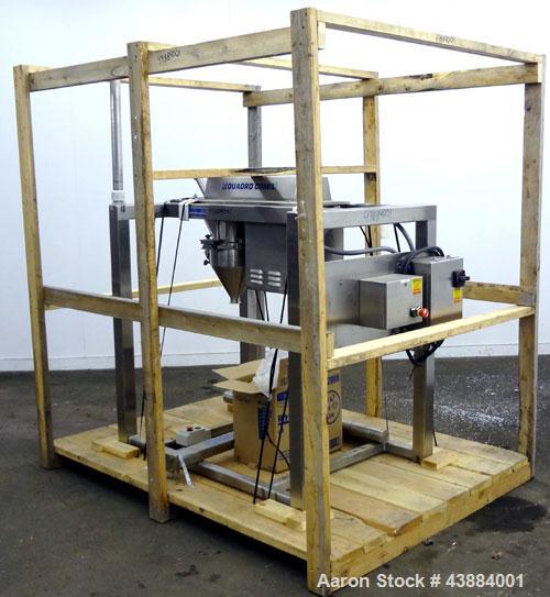 Used Quadro Comil, Model 194 Ultra, 316/304 Stainless Steel. Approximately 8" diameter impeller, with screens. Approximate capacity up to 4000 pounds an hour.  2" Tri-clamp top feed, bottom discharge...
