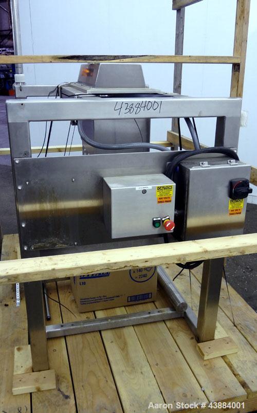 Used Quadro Comil, Model 194 Ultra, 316/304 Stainless Steel. Approximately 8" diameter impeller, with screens. Approximate capacity up to 4000 pounds an hour.  2" Tri-clamp top feed, bottom discharge...