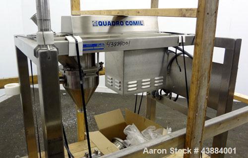 Used Quadro Comil, Model 194 Ultra, 316/304 Stainless Steel. Approximately 8" diameter impeller, with screens. Approximate capacity up to 4000 pounds an hour.  2" Tri-clamp top feed, bottom discharge...