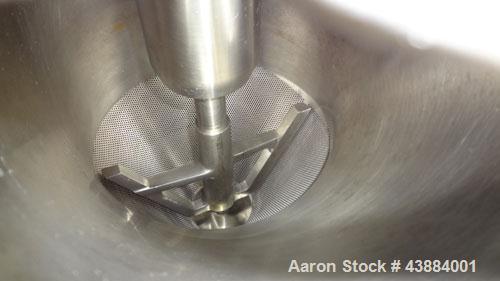 Used Quadro Comil, Model 194 Ultra, 316/304 Stainless Steel. Approximately 8" diameter impeller, with screens. Approximate capacity up to 4000 pounds an hour.  2" Tri-clamp top feed, bottom discharge...