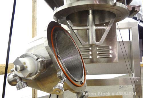 Used Quadro Comil, Model 194 Ultra, 316/304 Stainless Steel. Approximately 8" diameter impeller, with screens. Approximate capacity up to 4000 pounds an hour.  2" Tri-clamp top feed, bottom discharge...