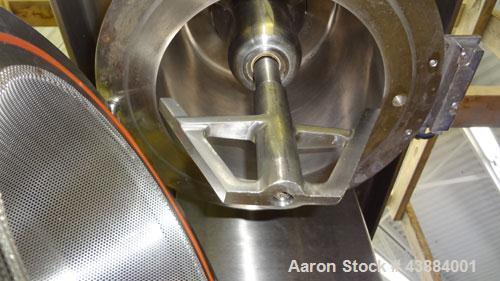 Used Quadro Comil, Model 194 Ultra, 316/304 Stainless Steel. Approximately 8" diameter impeller, with screens. Approximate capacity up to 4000 pounds an hour.  2" Tri-clamp top feed, bottom discharge...
