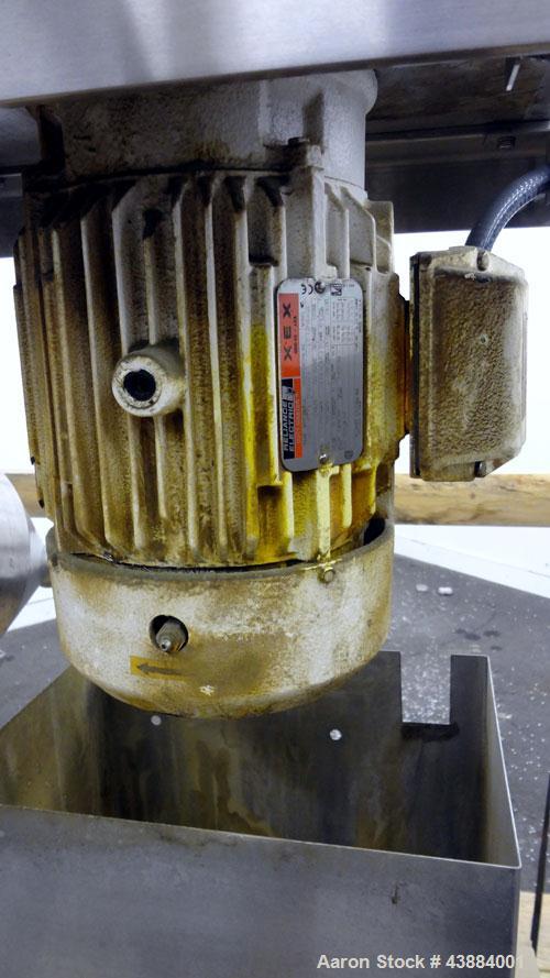 Used Quadro Comil, Model 194 Ultra, 316/304 Stainless Steel. Approximately 8" diameter impeller, with screens. Approximate capacity up to 4000 pounds an hour.  2" Tri-clamp top feed, bottom discharge...