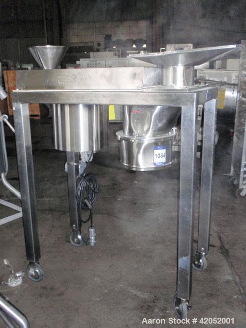 Used Quadro Comil, Model 196S, Stainless Steel. Approximately 12" diameter screen. Approximate capacity up to 8000 pounds an hour. Includes screen and beater bar. Driven by an approximately 15 hp mot...