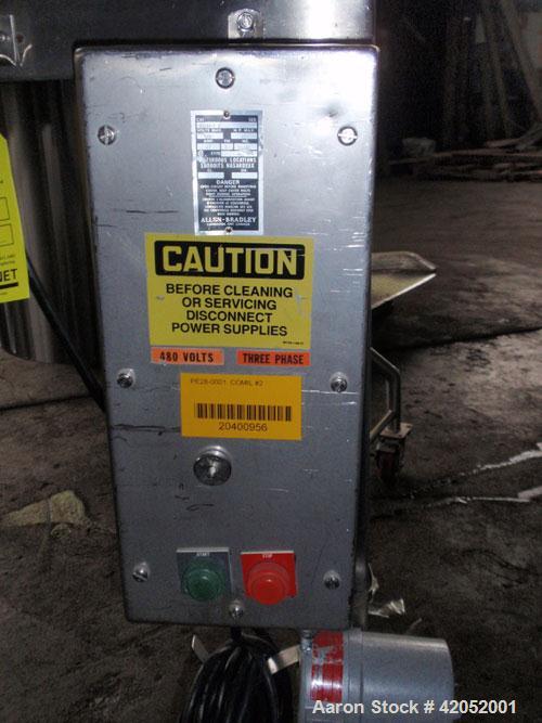Used Quadro Comil, Model 196S, Stainless Steel. Approximately 12" diameter screen. Approximate capacity up to 8000 pounds an hour. Includes screen and beater bar. Driven by an approximately 15 hp mot...
