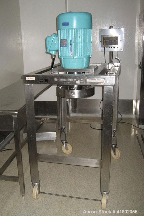 Used Quadro Comil, Model 196, Stainless Steel. Approximate capacity up to 8000 pounds an hour. Top feed, bottom discharge. Driven by a 7-1/2 hp, 3/60/230/460 volt motor. Mounted on stainless steel le...
