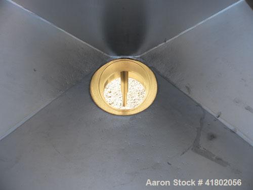 Used Quadro Comil, Model 196, 316 Stainless Steel. Approximate 12" diameter screen,  Approximate capacity up to 8000 pounds an hour. 6’’ diameter top feed with a hopper, and barrel holder, bottom dis...