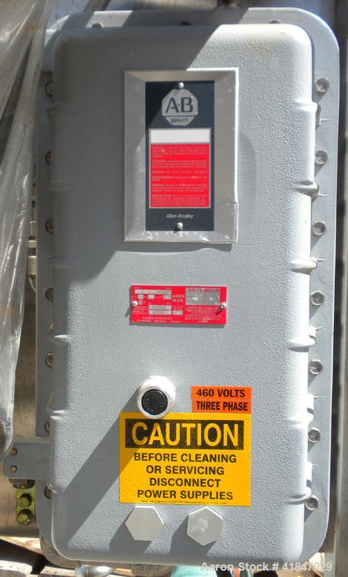 Used Quadro Comil, Model 196, 316 Stainless Steel. Requires an approximate 12" diameter screen.  Approximate capacity up to 8000 pounds an hour. Top feed, bottom discharge. Includes beater bar. Drive...