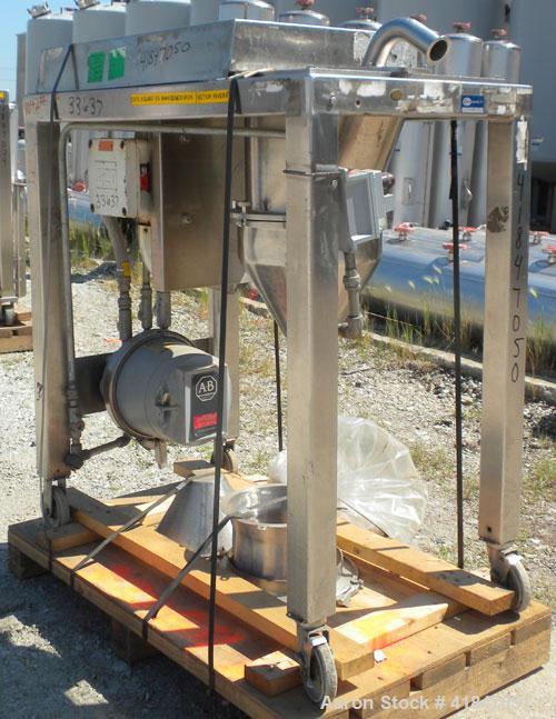 Used Quadro Comil, Model 196, 316 Stainless Steel. Approximate 12" diameter screen,  Approximate capacity up to 8000 pounds an hour. Top feed, bottom discharge. Includes screen, and beater bar. Drive...