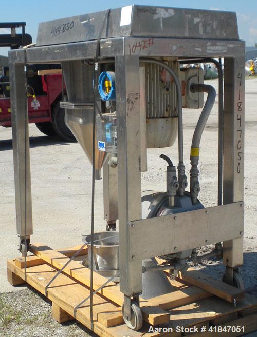 Used Quadro Comil, Model 196, 316 Stainless Steel. Approximate 12" diameter screen,  Approximate capacity up to 8000 pounds an hour. Top feed, bottom discharge. Includes screen, and beater bar. Drive...
