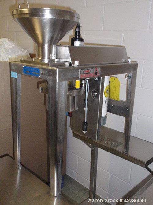 Used Quadro Comil, Model 197S. Stainless steel construction, on base with beater, 1HP, 90 volt DC motor with controller, serial# 197-0736.