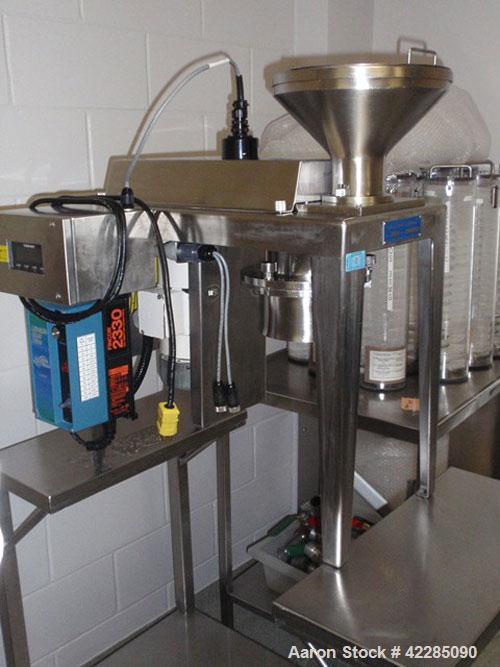 Used Quadro Comil, Model 197S. Stainless steel construction, on base with beater, 1HP, 90 volt DC motor with controller, serial# 197-0736.