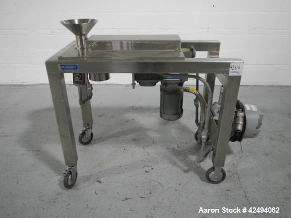 Used Quadro Comil, model 197S, stainless steel construction, with beater, on stainless steel stand with 1 hp, 1745 rpm, 230/460 volt mechanical variable speed motor drive, xp, serial# 197-0430.