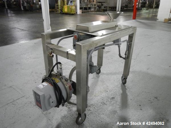 Used Quadro Comil, model 197S, stainless steel construction, with beater, on stainless steel stand with 1 hp, 1745 rpm, 230/460 volt mechanical variable speed motor drive, xp, serial# 197-0430.