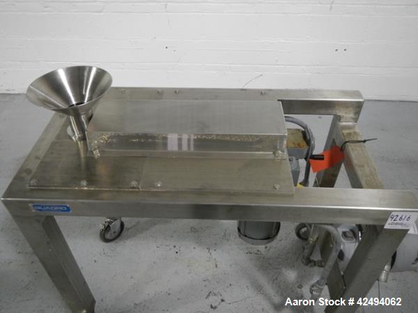 Used Quadro Comil, model 197S, stainless steel construction, with beater, on stainless steel stand with 1 hp, 1745 rpm, 230/460 volt mechanical variable speed motor drive, xp, serial# 197-0430.