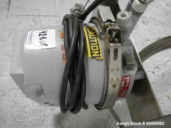 Used Quadro Comil, model 197S, stainless steel construction, with beater, on stainless steel stand with 1 hp, 1745 rpm, 230/460 volt mechanical variable speed motor drive, xp, serial# 197-0430.