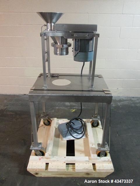 Used Quadro Comil, Model 197S, Stainless Steel. With beater and screen. Mounted on portable cart with 1hp, 230/460 volt XP motor. Serial# 197-1-061.