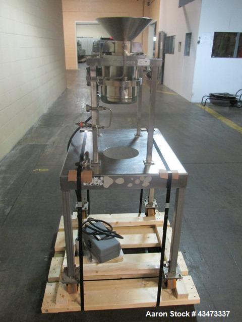 Used Quadro Comil, Model 197S, Stainless Steel. With beater and screen. Mounted on portable cart with 1hp, 230/460 volt XP motor. Serial# 197-1-061.