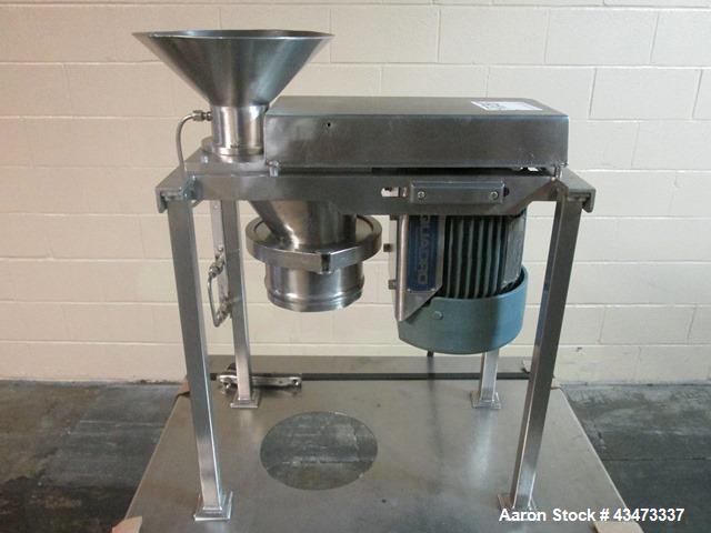 Used Quadro Comil, Model 197S, Stainless Steel. With beater and screen. Mounted on portable cart with 1hp, 230/460 volt XP motor. Serial# 197-1-061.