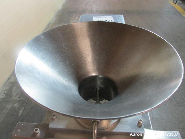 Used Quadro Comil, Model 197S, Stainless Steel. With beater and screen. Mounted on portable cart with 1hp, 230/460 volt XP motor. Serial# 197-1-061.
