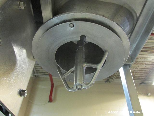 Used Quadro Comil, Model 197S, Stainless Steel. With beater and screen. Mounted on portable cart with 1hp, 230/460 volt XP motor. Serial# 197-1-061.