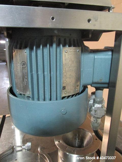 Used Quadro Comil, Model 197S, Stainless Steel. With beater and screen. Mounted on portable cart with 1hp, 230/460 volt XP motor. Serial# 197-1-061.