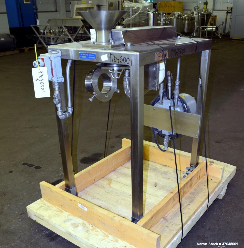 Used Quadro Comil, Model 197S, 316 Stainless Steel. Approximate 5" diameter impeller with screen. Approximate capacity up to 250-750 pounds an hour. Includes a top feed hopper, bottom discharge chute...