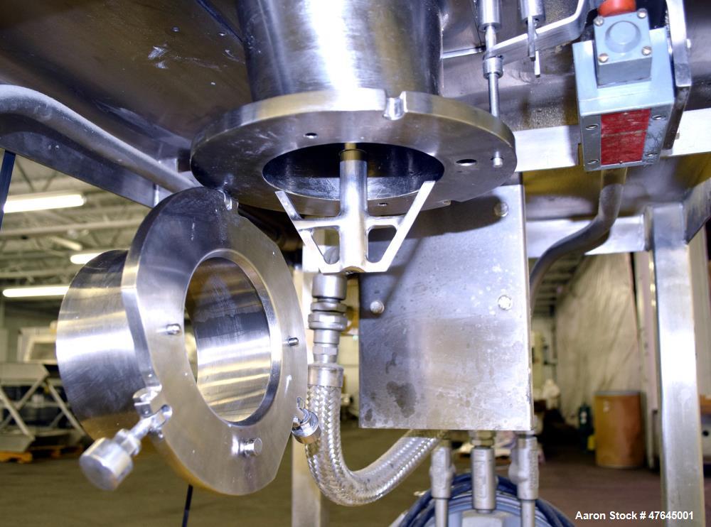 Used Quadro Comil, Model 197S, 316 Stainless Steel. Approximate 5" diameter impeller with screen. Approximate capacity up to 250-750 pounds an hour. Includes a top feed hopper, bottom discharge chute...