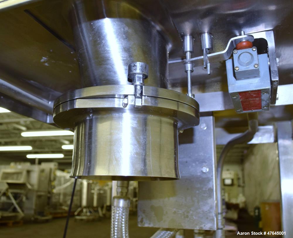 Used Quadro Comil, Model 197S, 316 Stainless Steel. Approximate 5" diameter impeller with screen. Approximate capacity up to 250-750 pounds an hour. Includes a top feed hopper, bottom discharge chute...